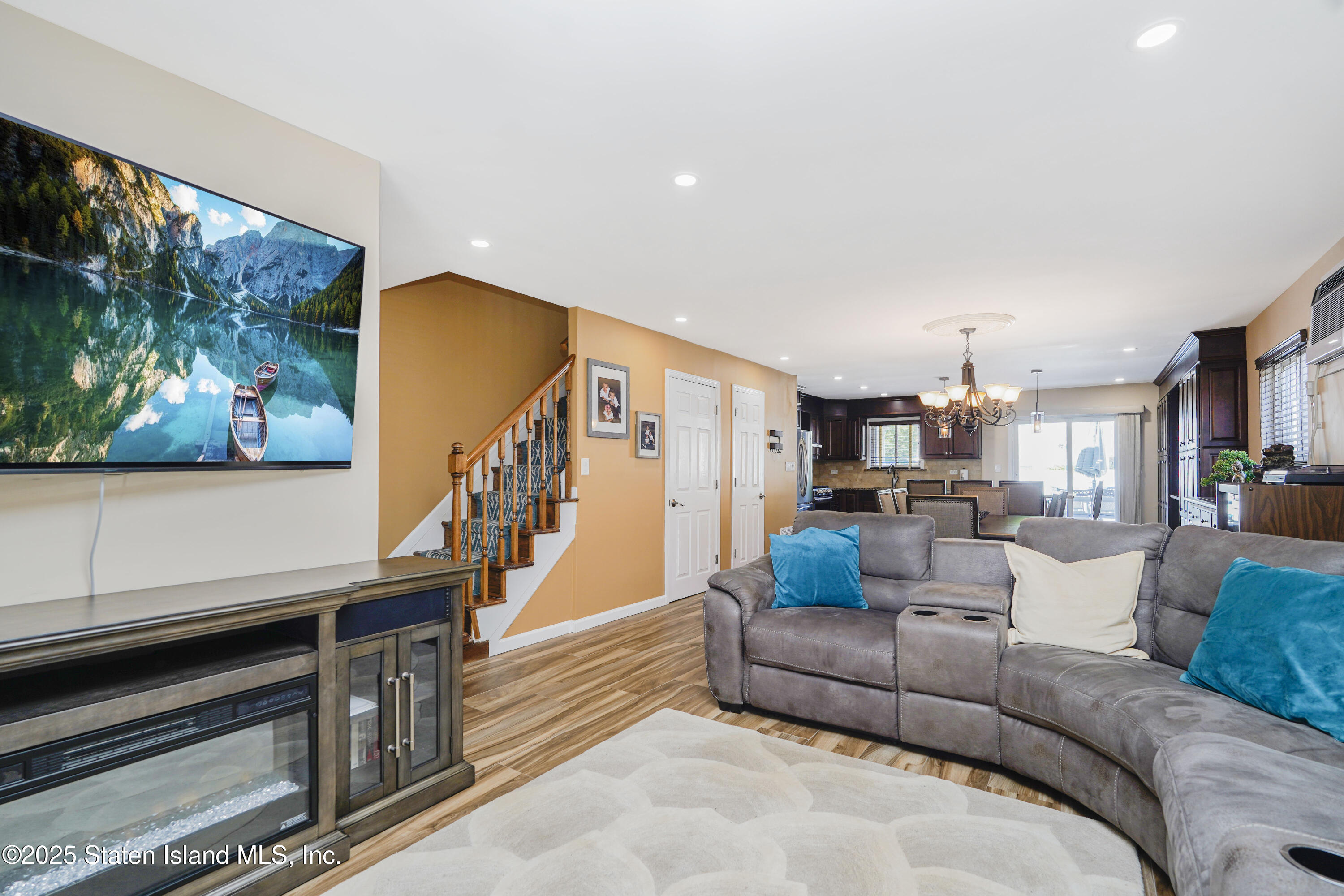 80 Gold Avenue Staten Island, NY 10312 - Photo 3 of 33 a living room with furniture and a flat screen tv
