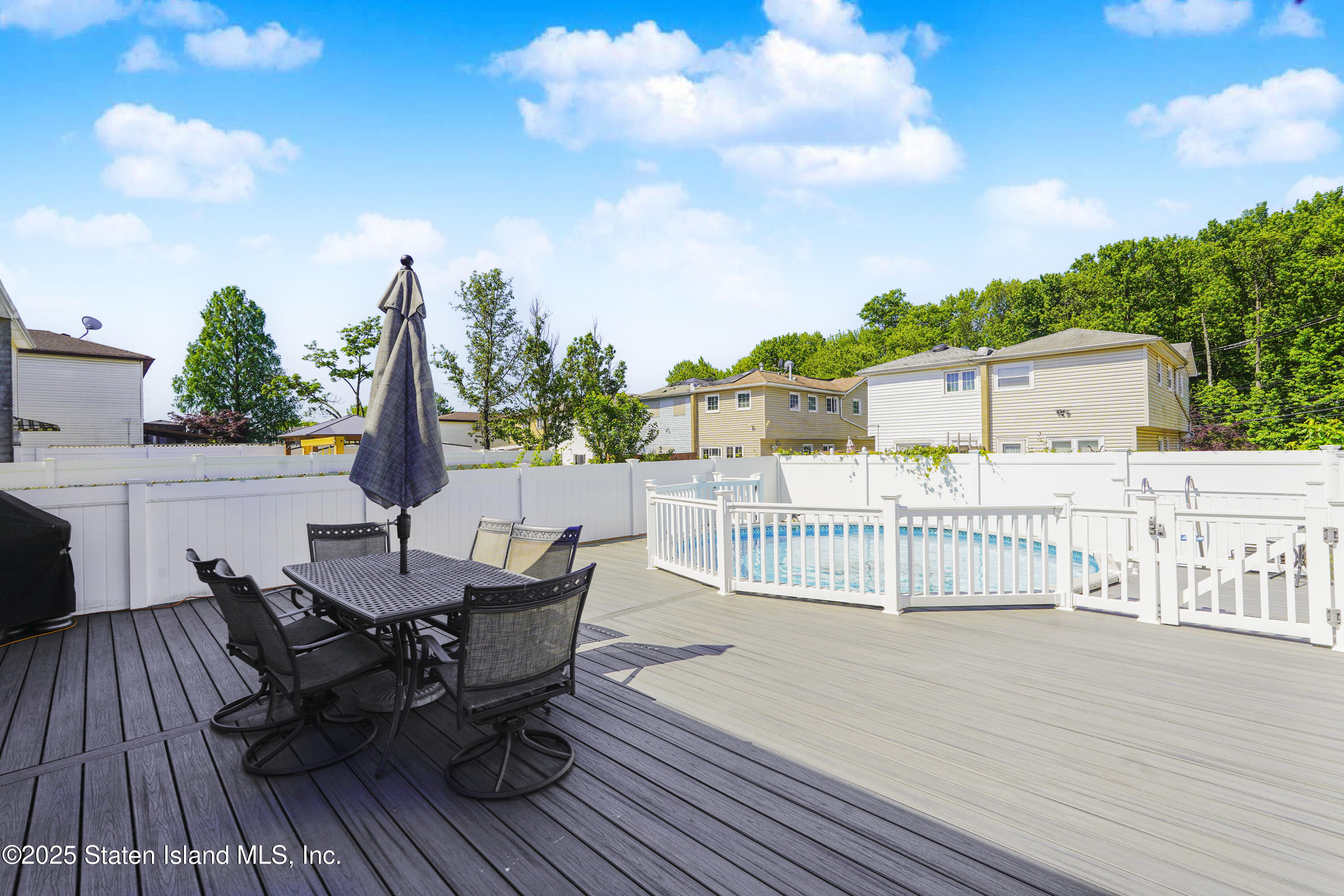 80 Gold Avenue Staten Island, NY 10312 - Photo 32 of 33 a view of a deck with furniture and a table