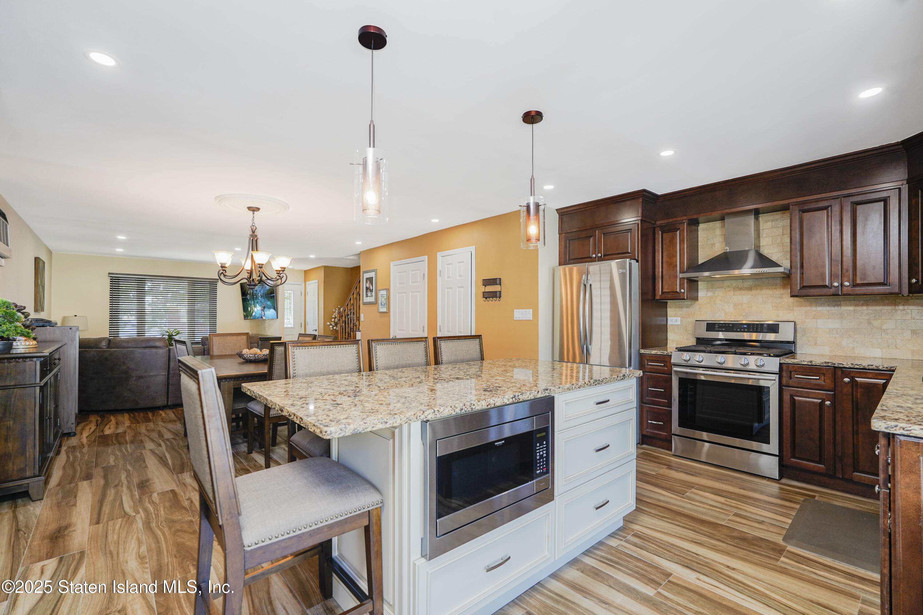 80 Gold Avenue Staten Island, NY 10312 - Photo 8 of 33 a large kitchen with kitchen island a large island in the center