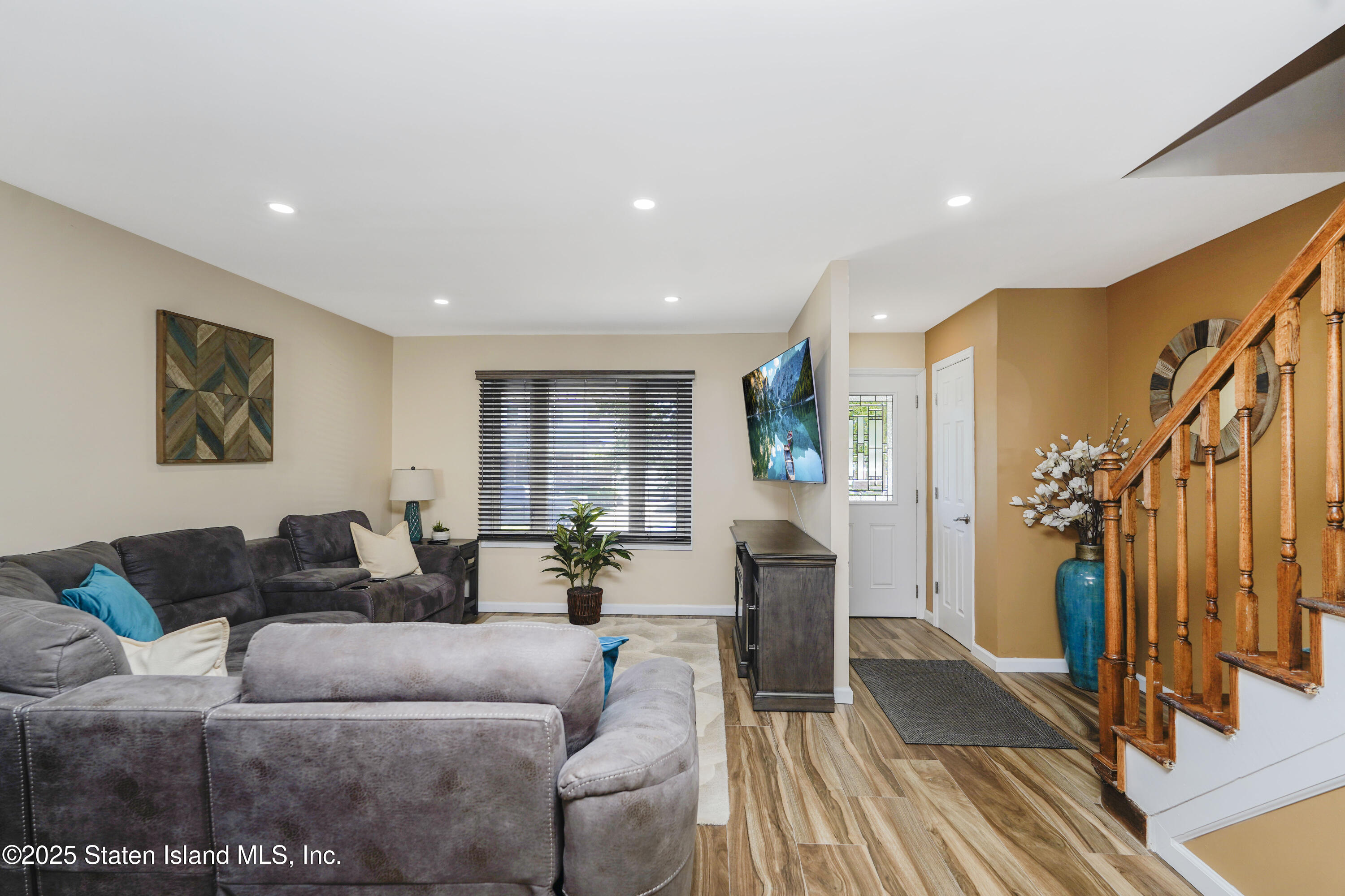 80 Gold Avenue Staten Island, NY 10312 - Photo 10 of 33 a living room with furniture and wooden floor
