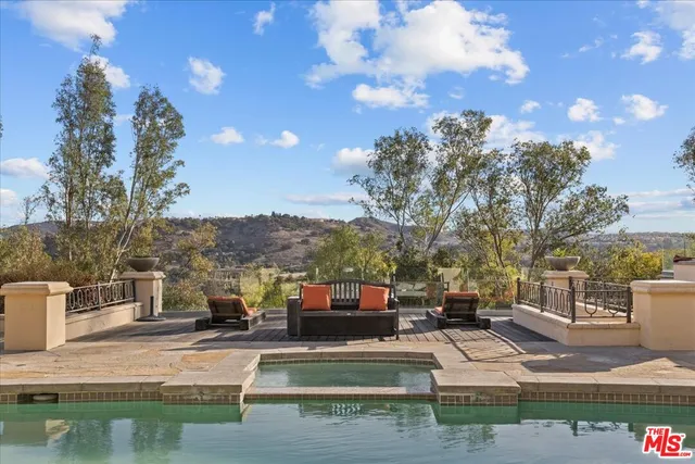 a view of multiple houses with a street