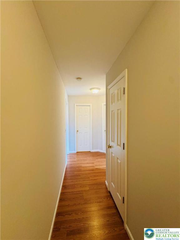 4034 Reeve Drive Bethlehem, PA 18020 - Photo 14 of 36 a view of a hallway with wooden floor