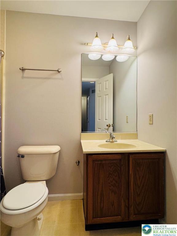 4034 Reeve Drive Bethlehem, PA 18020 - Photo 27 of 36 a bathroom with a toilet a sink and mirror