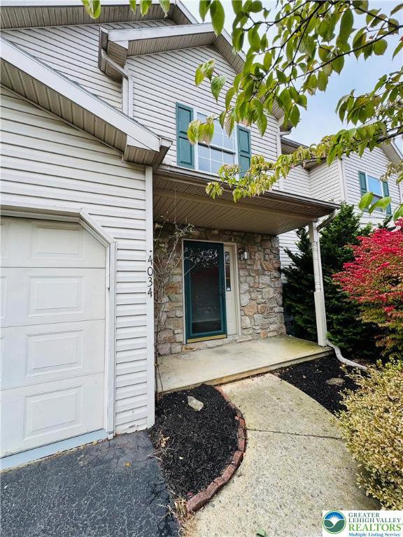 4034 Reeve Drive Bethlehem, PA 18020 - Photo 34 of 36 a front view of a house with a garden