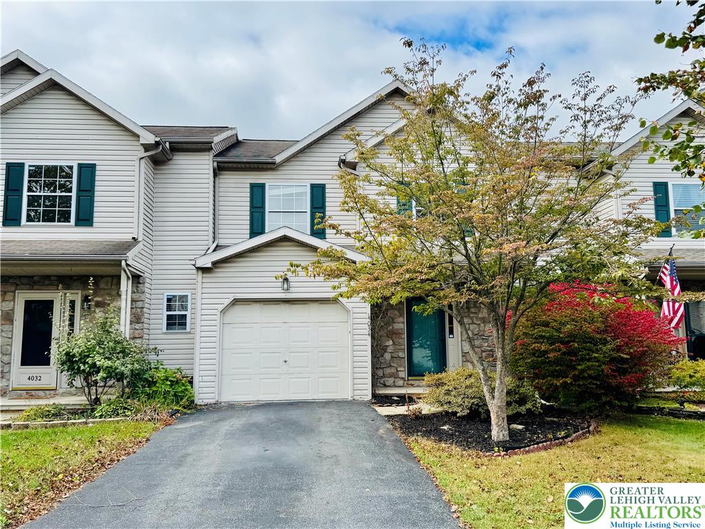 4034 Reeve Drive Bethlehem, PA 18020 - Photo 35 of 36 a view of a house with a yard and potted plants
