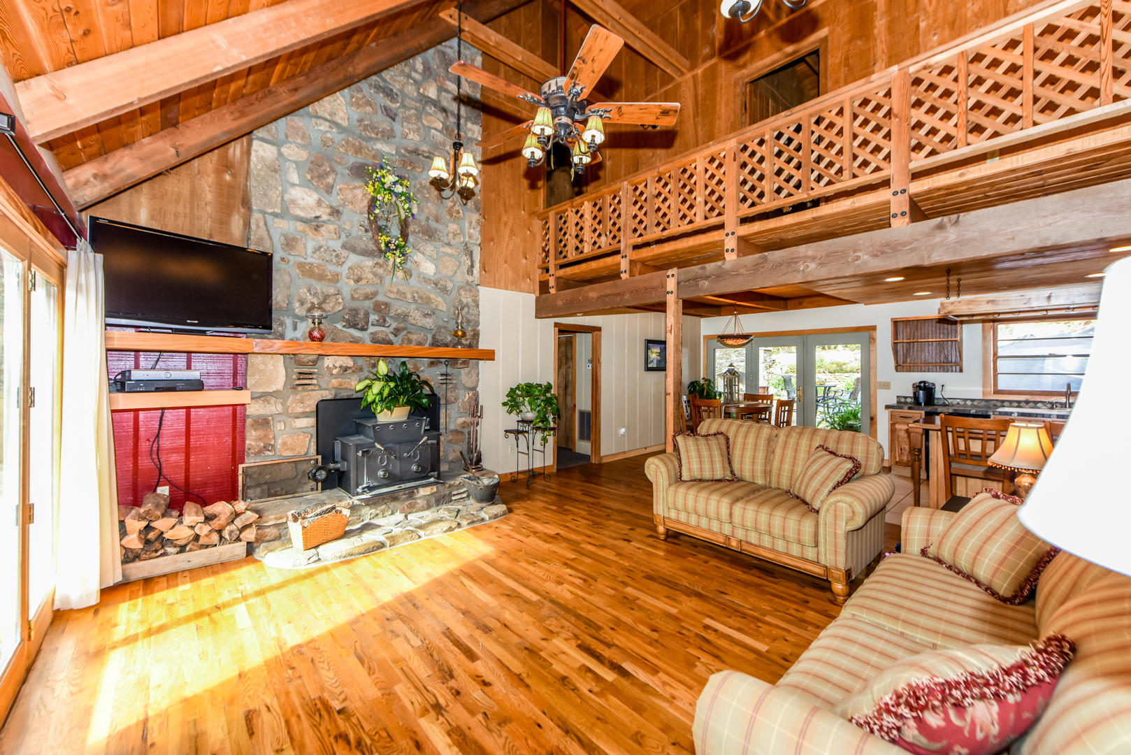 3967 Sevierville Road Maryville, TN 37804 - Photo 14 of 40 Living room with stone FP w/woodstove