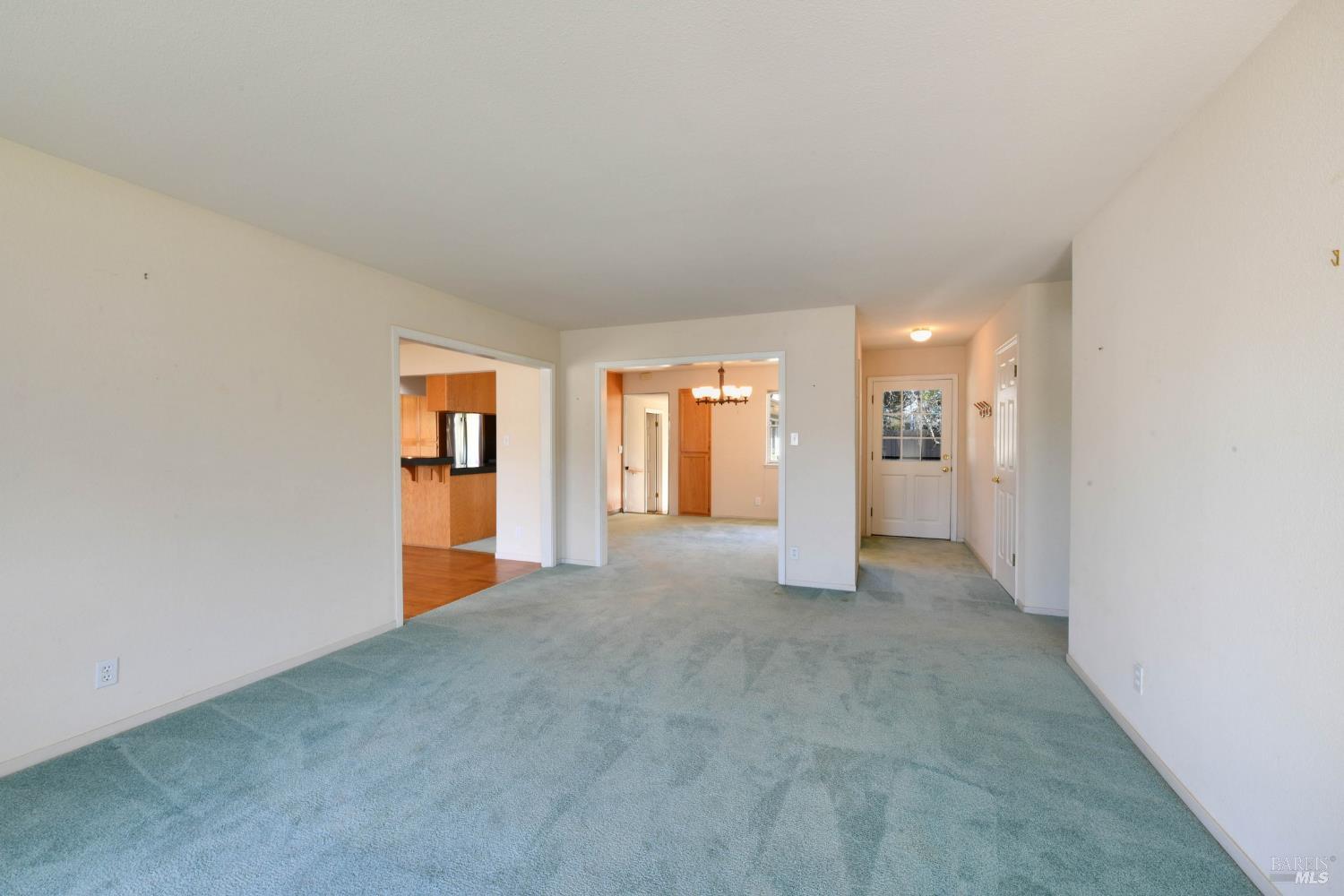 135 Fulton Place Windsor, CA 95492 - Photo 14 of 40 a view of a big room with closet and windows