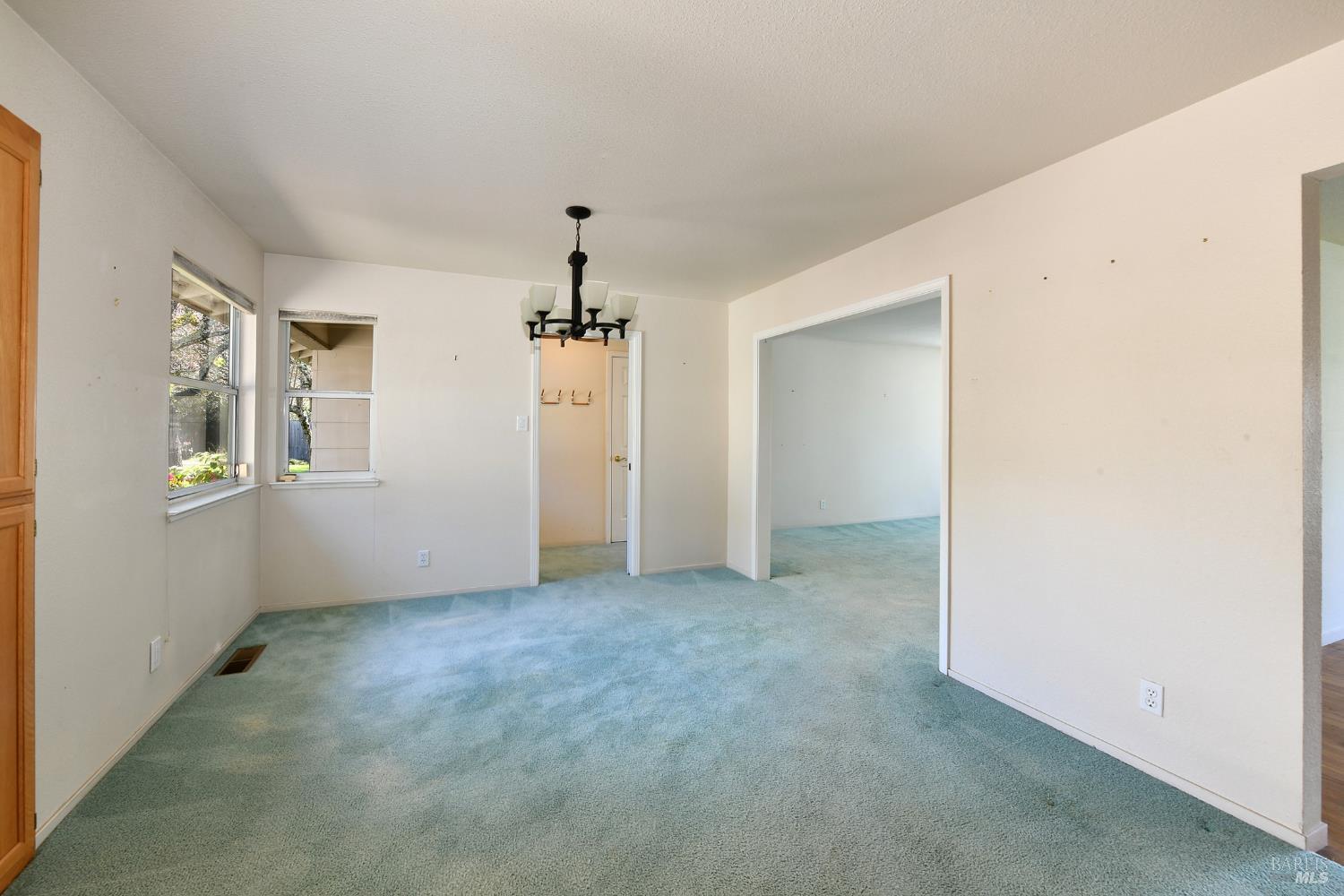 135 Fulton Place Windsor, CA 95492 - Photo 15 of 40 an empty room with windows and closet