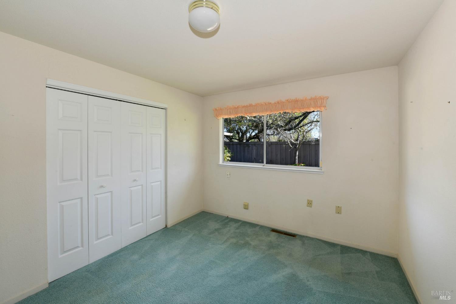 135 Fulton Place Windsor, CA 95492 - Photo 27 of 40 an empty room with windows