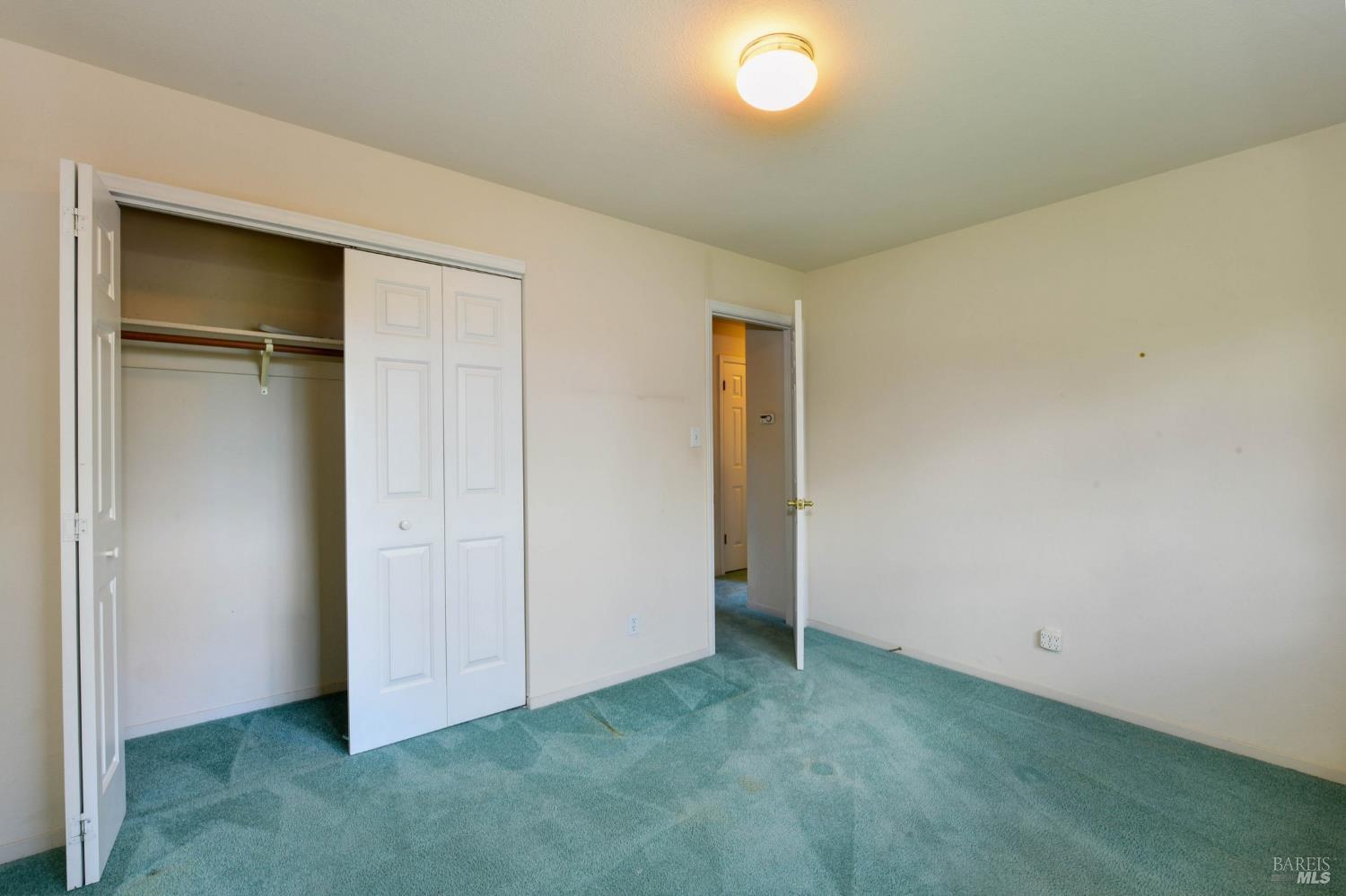 135 Fulton Place Windsor, CA 95492 - Photo 33 of 40 an empty room with closet area