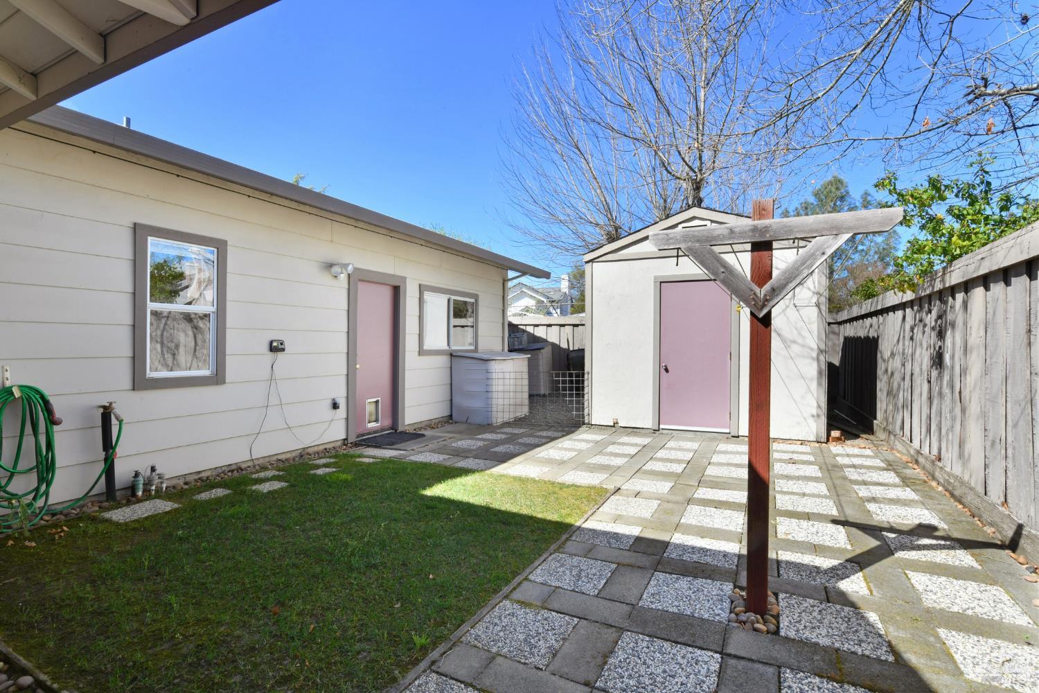 135 Fulton Place Windsor, CA 95492 - Photo 40 of 42 Storage shed and clothesline behind the garage