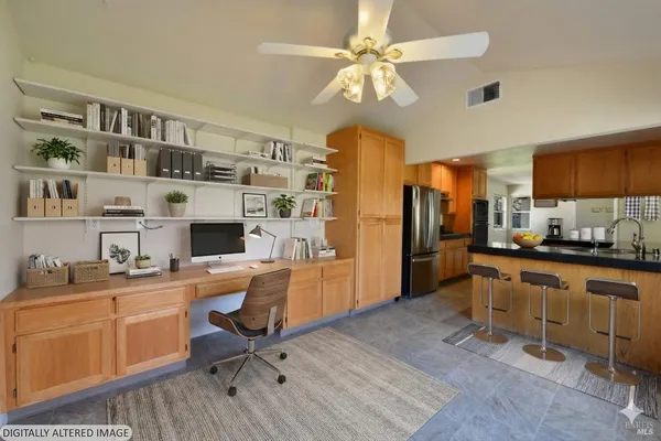 a view of a kitchen with workspace and a window