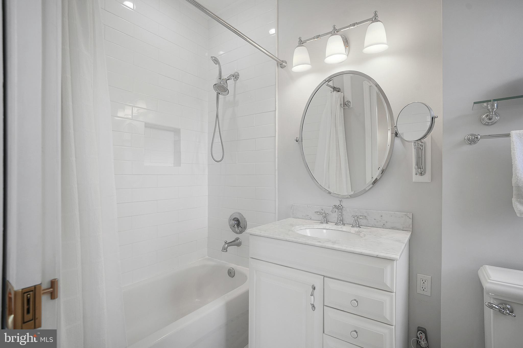 1657 31st Street Northwest, Unit 203 Washington, DC 20007 - Photo 16 of 24 Updated Bathroom