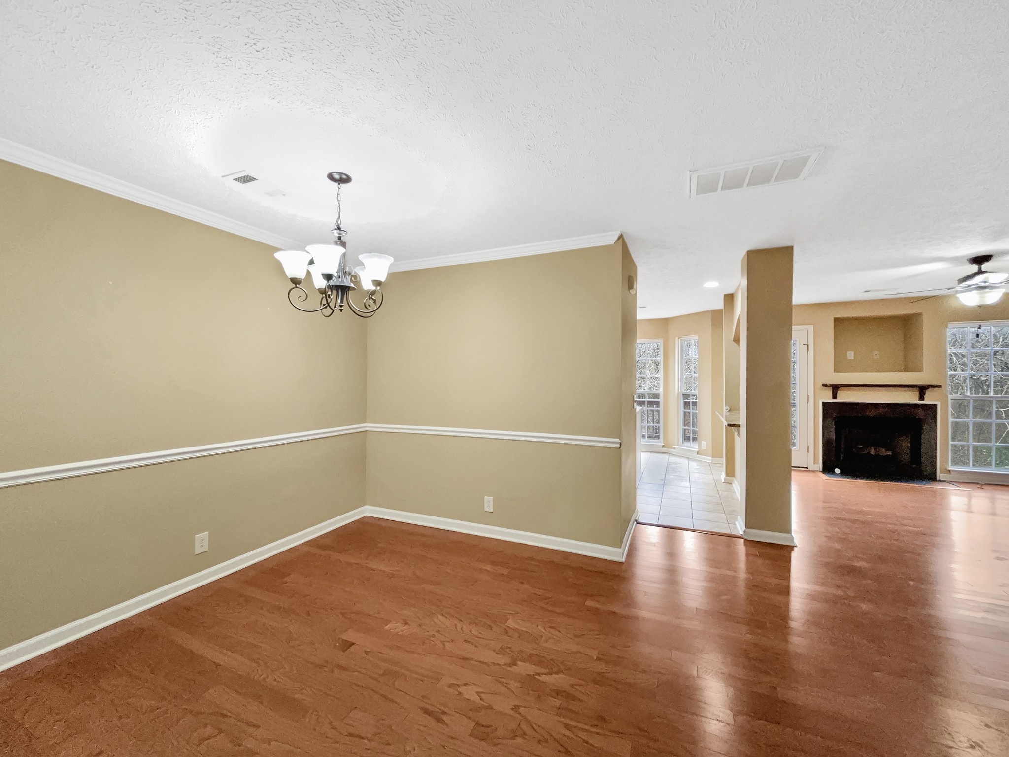741 Tulip Grove Road, Unit 603 Hermitage, TN 37076 - Photo 8 of 17 wooden floor in an empty room with a window