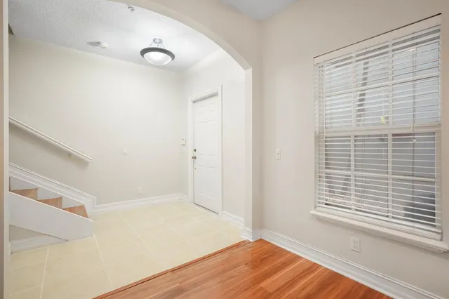 a view of a bench in front of a building