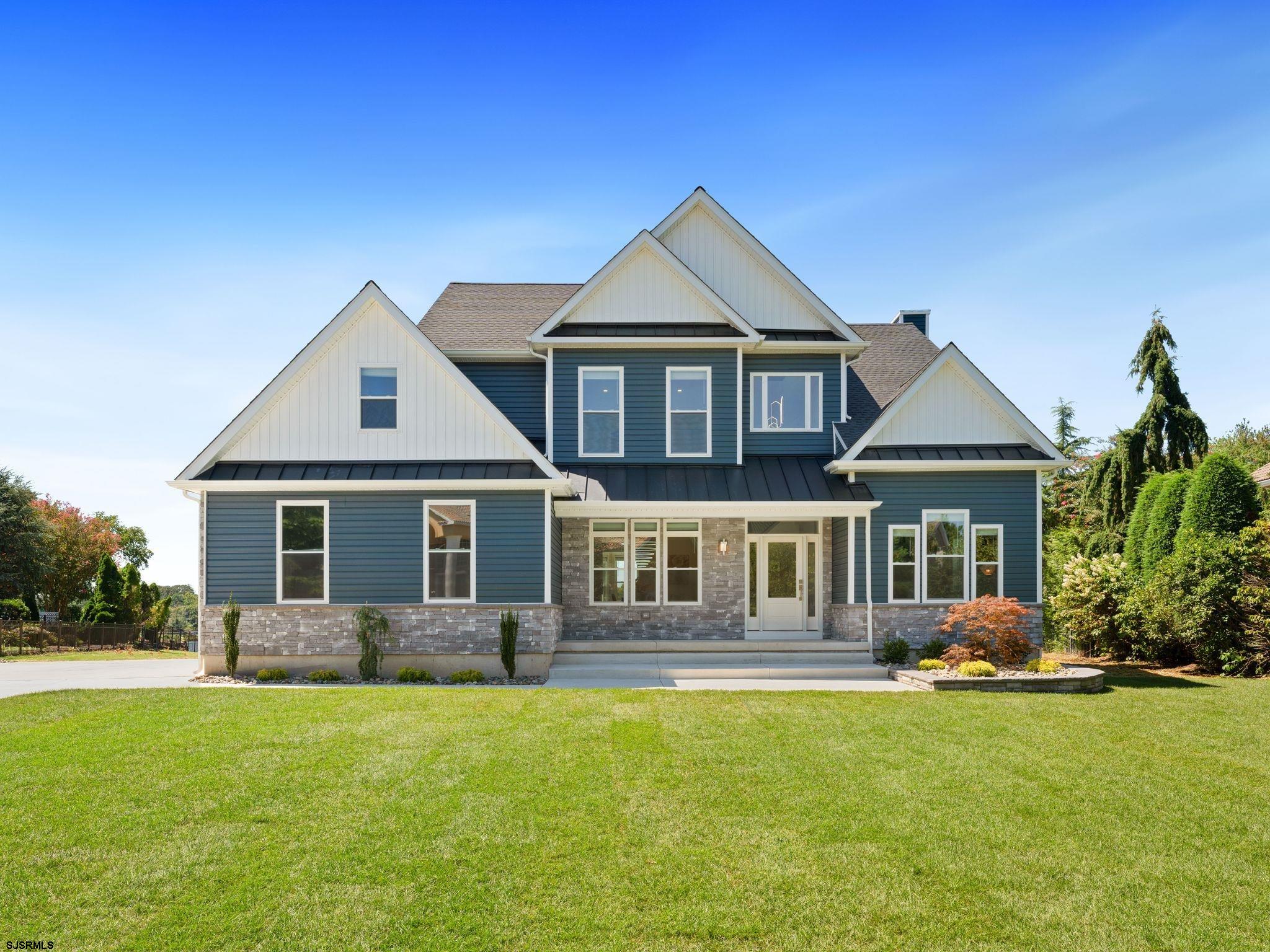 14 Wexford Lane Linwood, NJ 08221 - Photo 2 of 76 a front view of a house with a yard