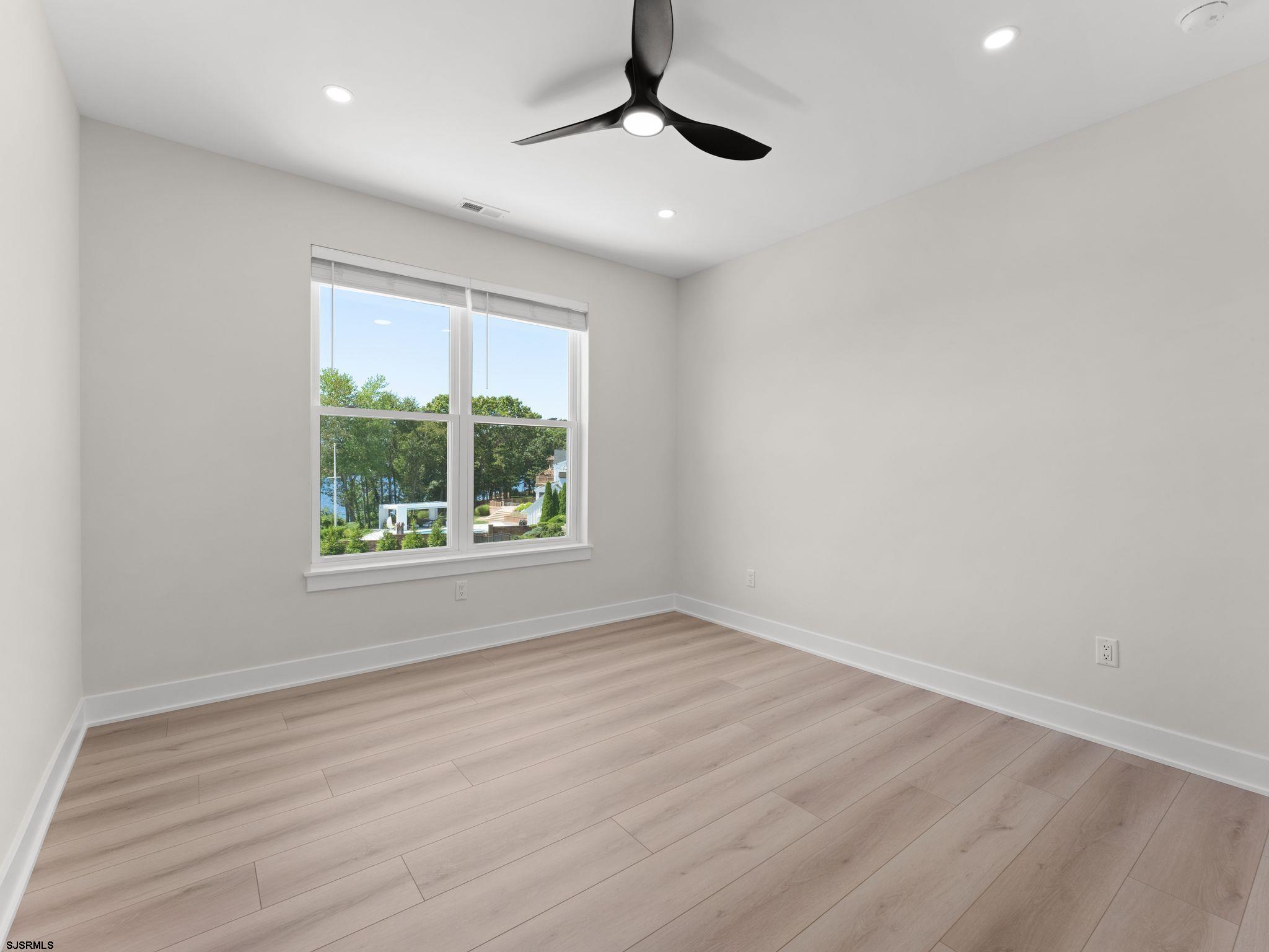 14 Wexford Lane Linwood, NJ 08221 - Photo 47 of 76 wooden floor in an empty room with a window