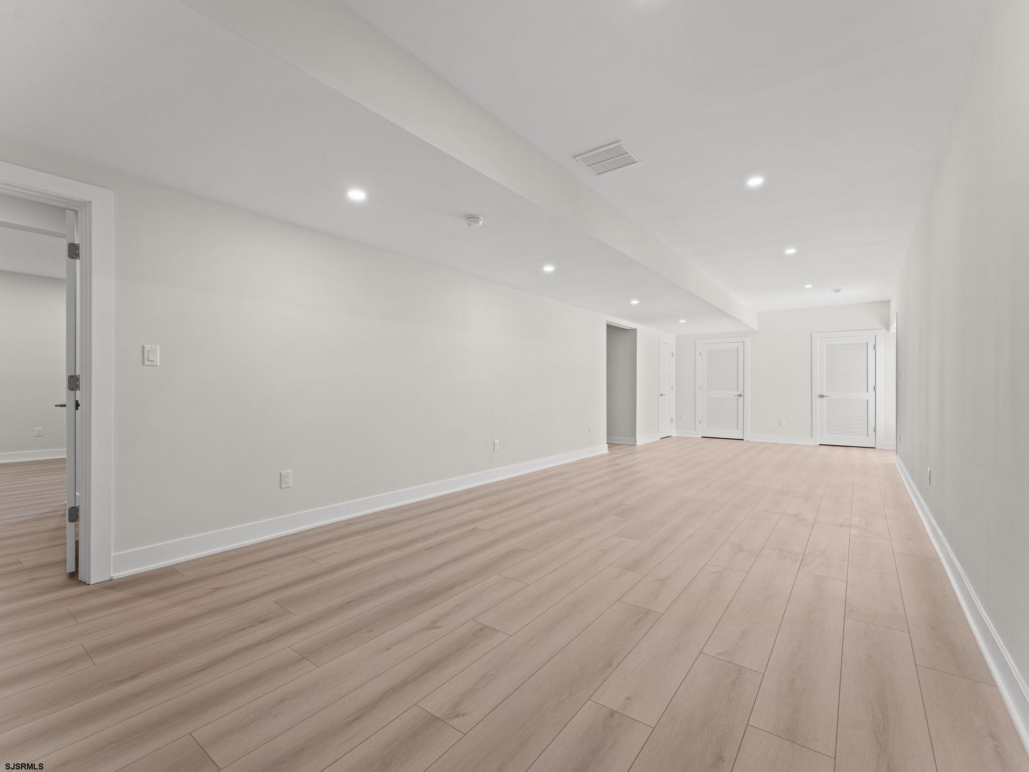 14 Wexford Lane Linwood, NJ 08221 - Photo 52 of 76 a view of empty room with wooden floor