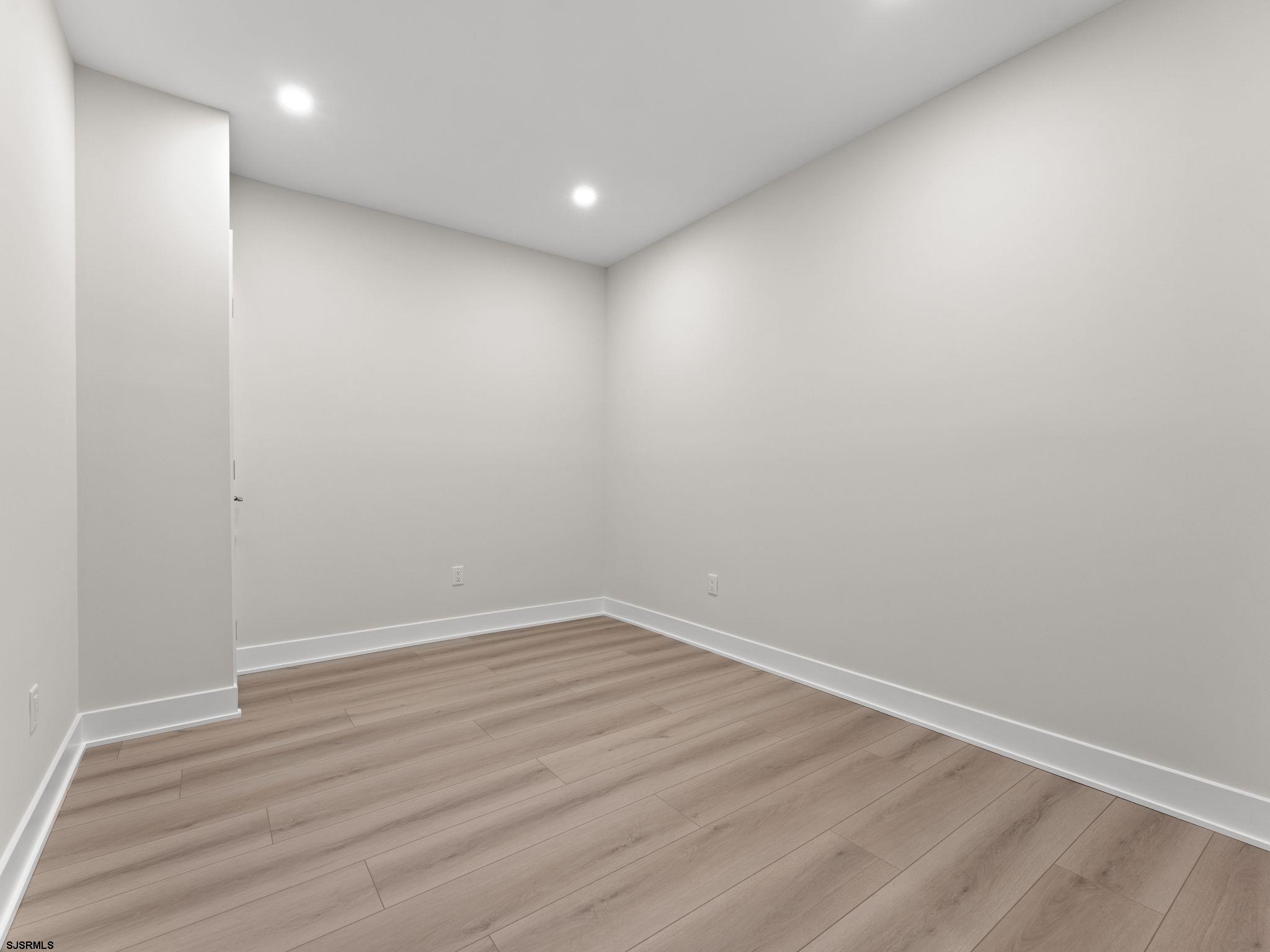14 Wexford Lane Linwood, NJ 08221 - Photo 53 of 76 a view of room with wooden floor