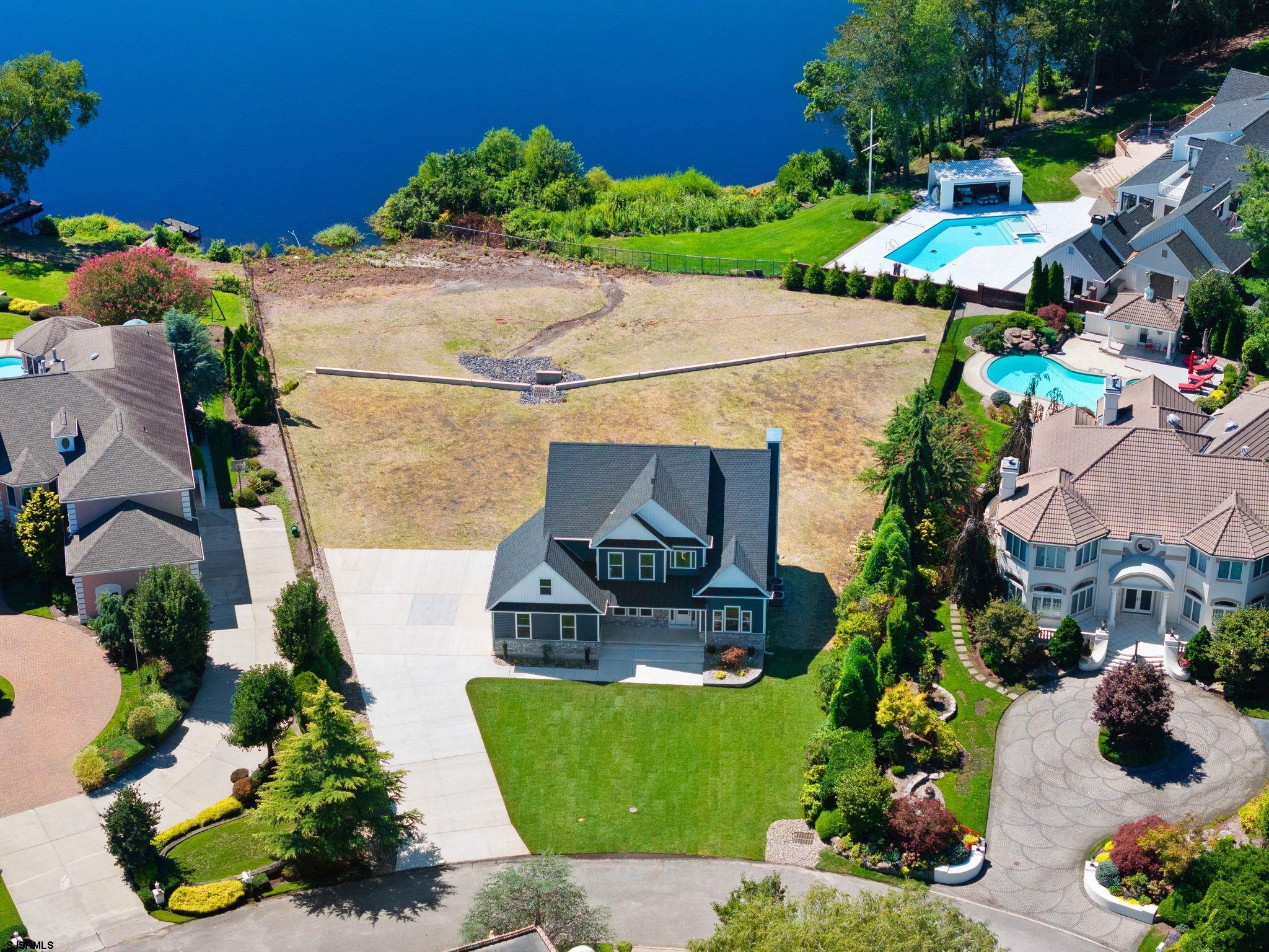 14 Wexford Lane Linwood, NJ 08221 - Photo 72 of 76 an aerial view of a house with a garden and swimming pool