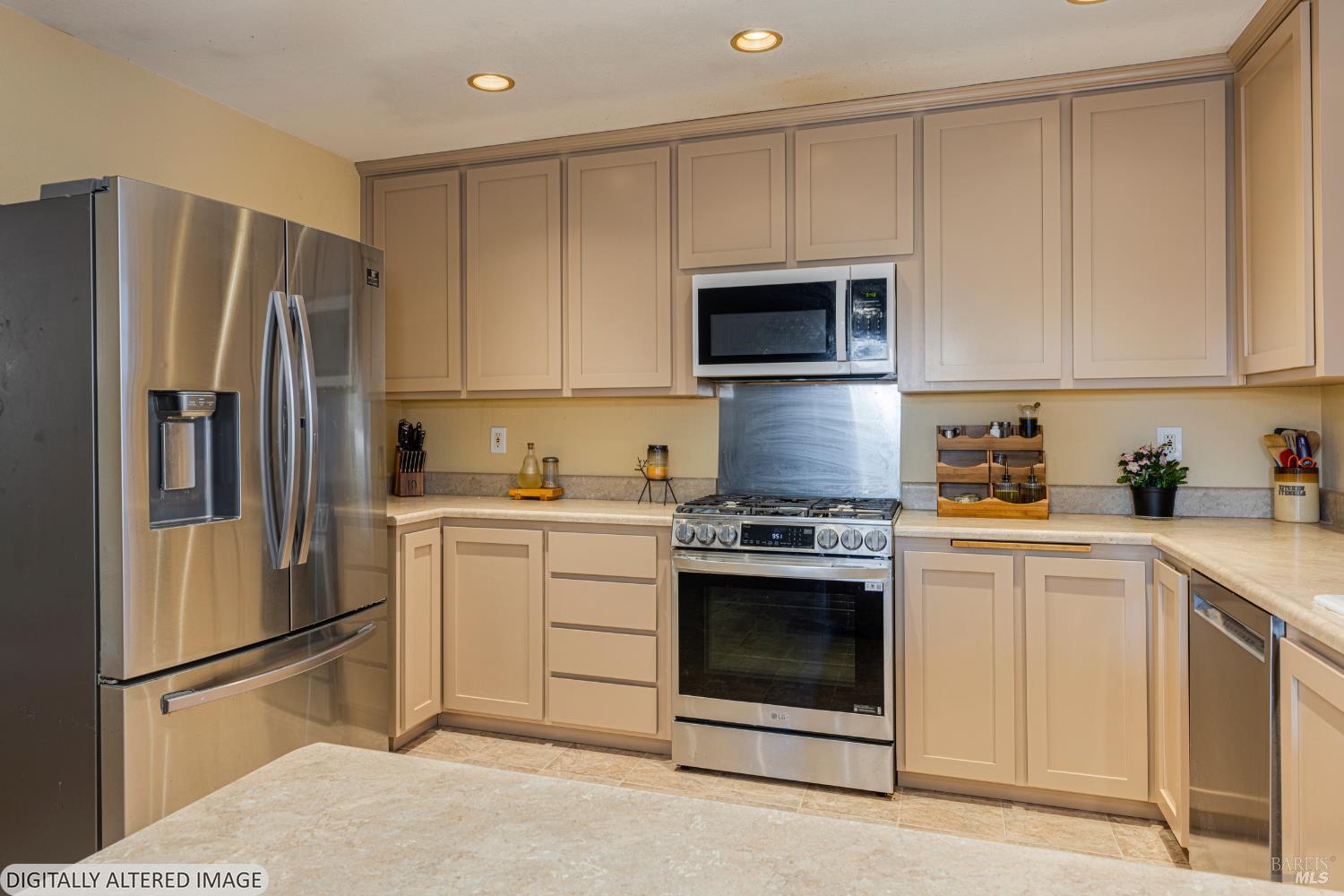 1387 Gillpepper Lane Rohnert Park, CA 94928 - Photo 11 of 36 a kitchen with cabinets stainless steel appliances and a counter space