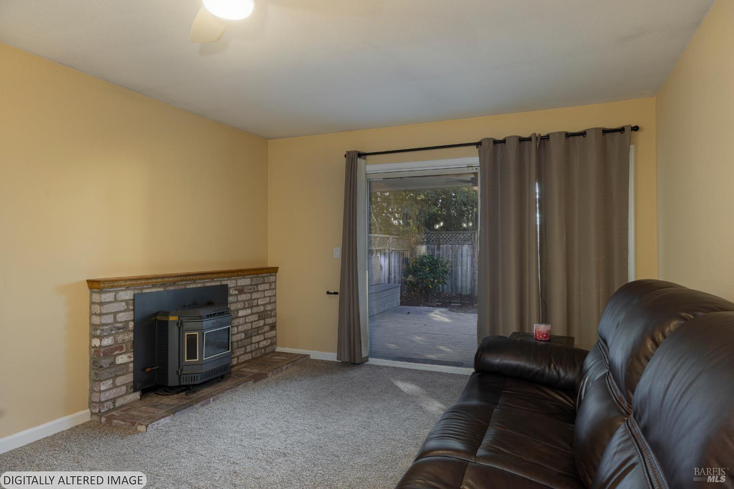 1387 Gillpepper Lane Rohnert Park, CA 94928 - Photo 12 of 36 a living room with furniture and a fireplace