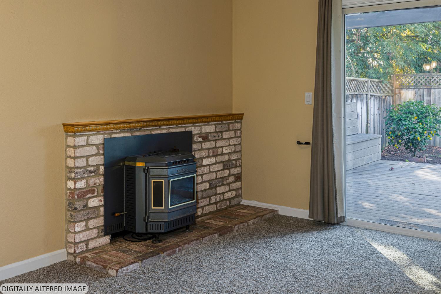 1387 Gillpepper Lane Rohnert Park, CA 94928 - Photo 13 of 36 a view of an empty room with a fireplace and a window