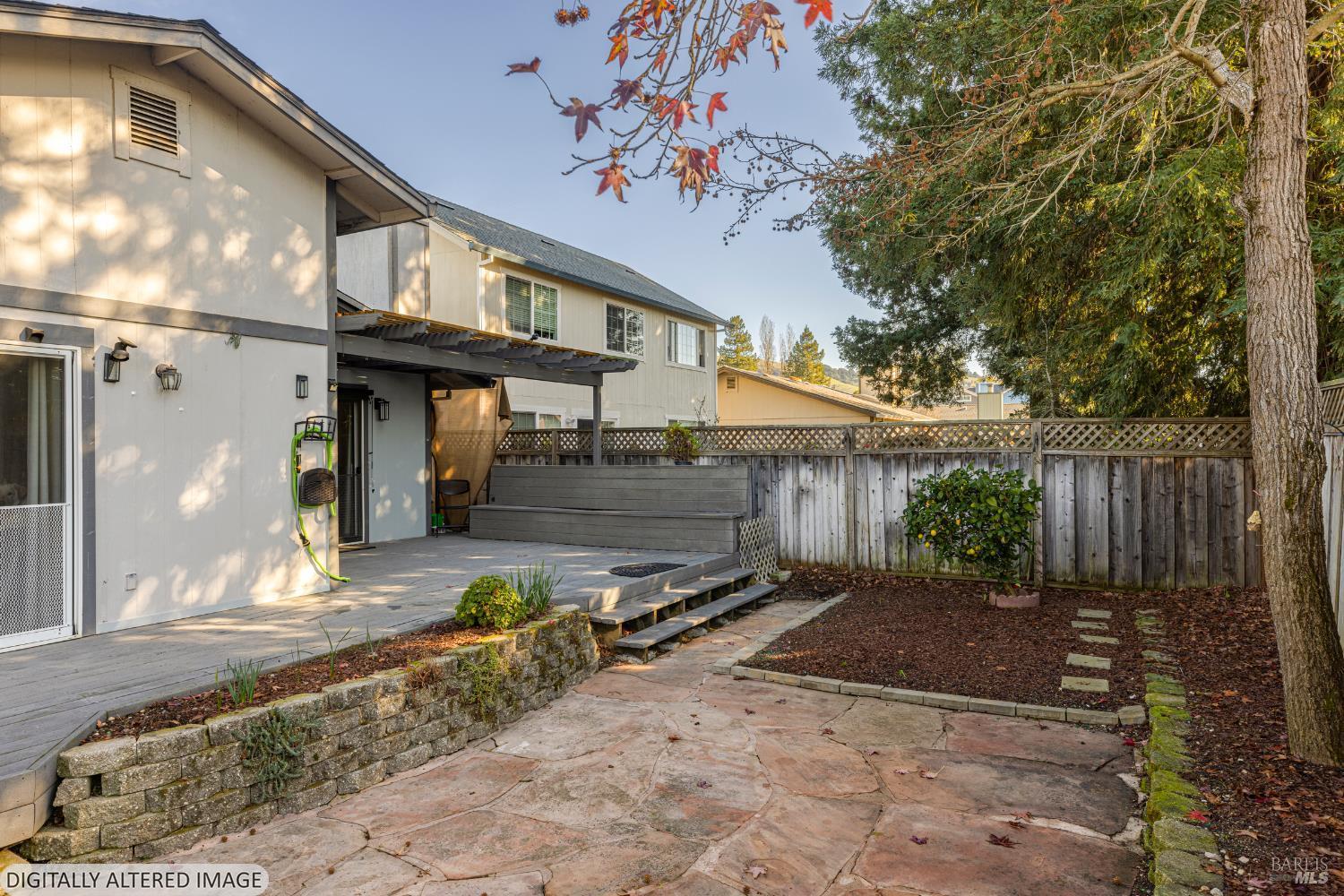 1387 Gillpepper Lane Rohnert Park, CA 94928 - Photo 24 of 36 a view of a dinning table and chairs in patio