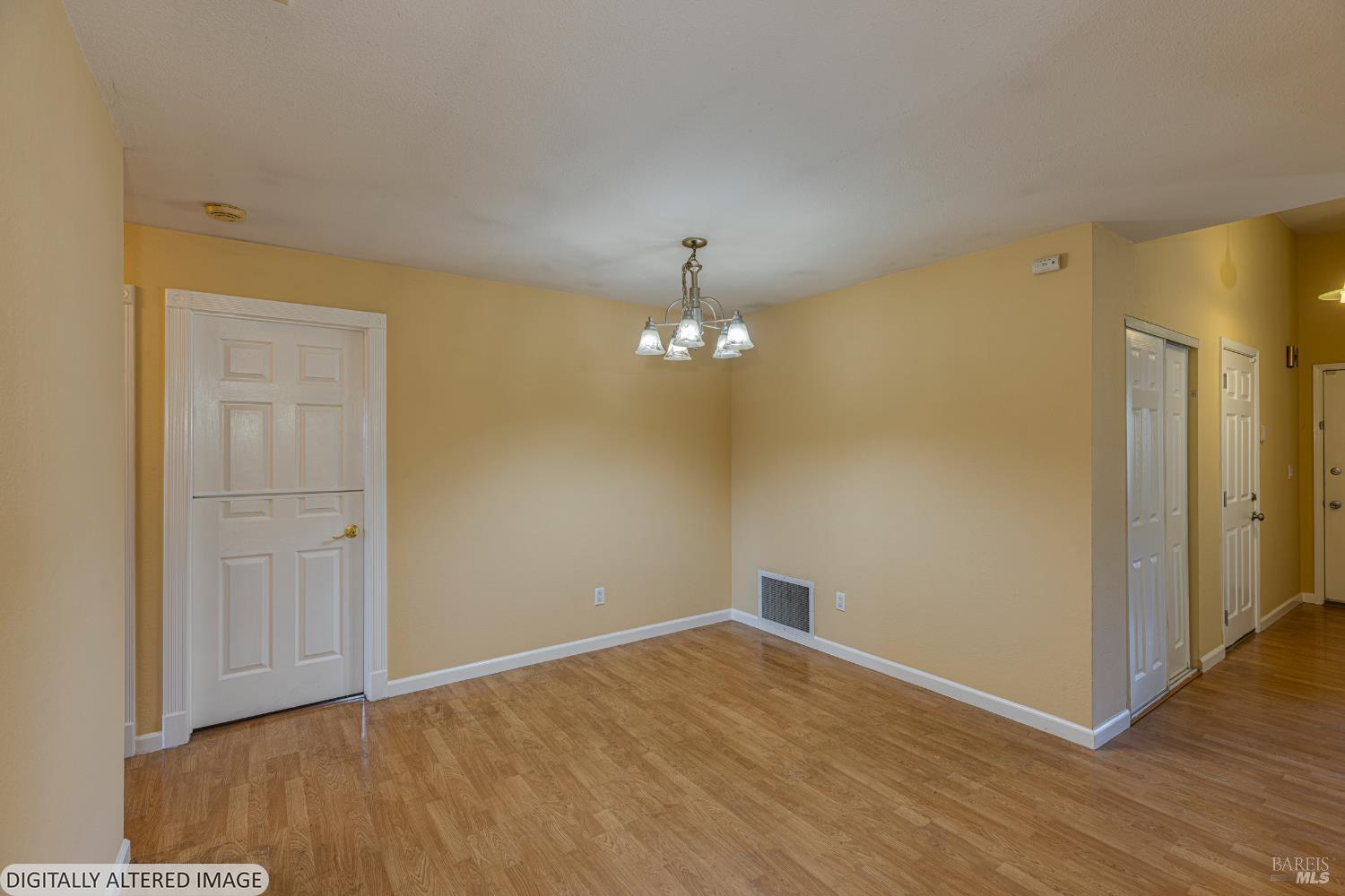 1387 Gillpepper Lane Rohnert Park, CA 94928 - Photo 7 of 36 a view of empty room with wooden floor and fan