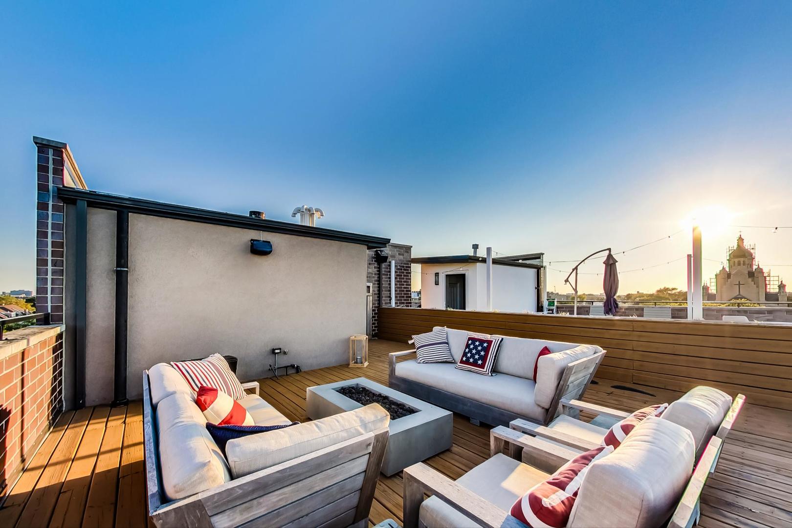 2144 West Rice Street, Unit 3E Chicago, IL 60622 - Photo 16 of 19 a outdoor living room with furniture