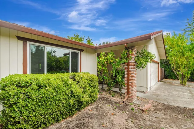 a view of livingroom with furniture and fireplace