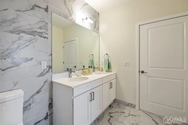 a bathroom with a bathtub and a toilet