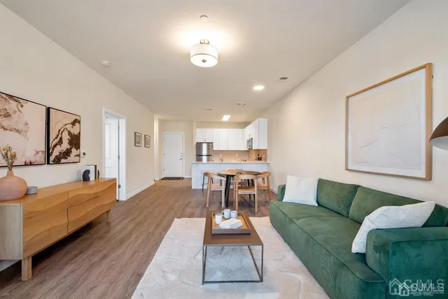 a kitchen with a table and chairs in it