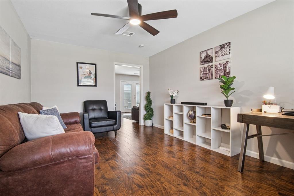 2404 17th Street Plano, TX 75074 - Photo 4 of 24 1st Living area. Note handsome wood floors throughout