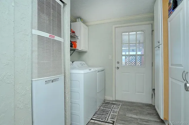 a big house with a large tree in front of it