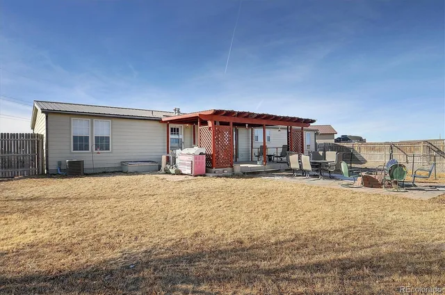 a house view with outdoor seating space