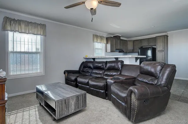 a kitchen with stainless steel appliances granite countertop a stove and a microwave oven