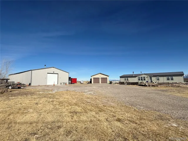 a view of a livingroom with a flat screen tv