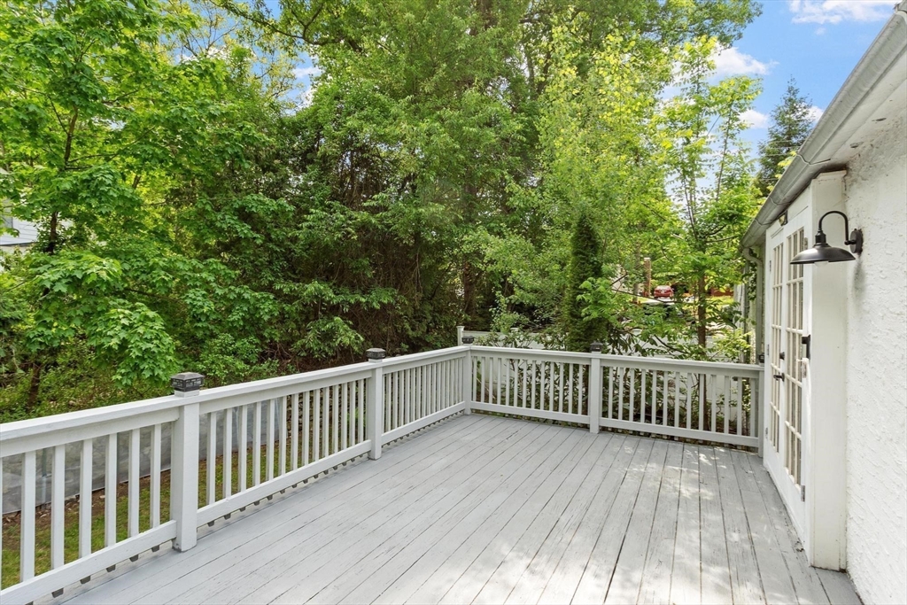 144 Bailey Road Holden, MA 01520 - Photo 35 of 42 a view of deck with wooden floor and fence