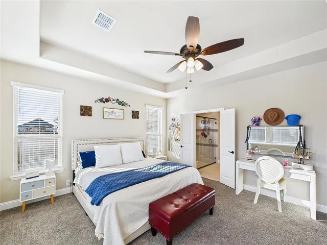 a bedroom with a bed furniture and window