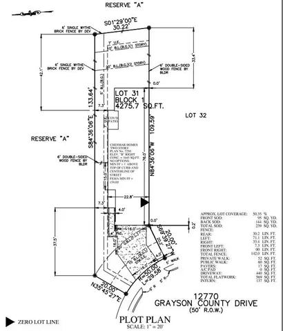 a view of a building with a yard and plants