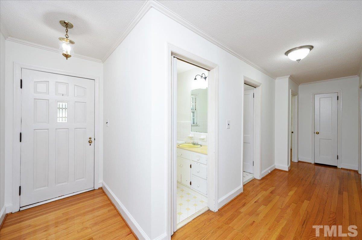 755 Wait Avenue Wake Forest, NC 27587 - Photo 3 of 23 a view of hallway with wooden floor