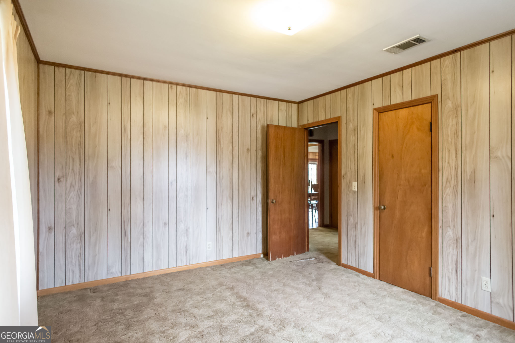 1917 Gilchrist Avenue Waycross, GA 31503 - Photo 33 of 42 a view of entryway with wooden walls
