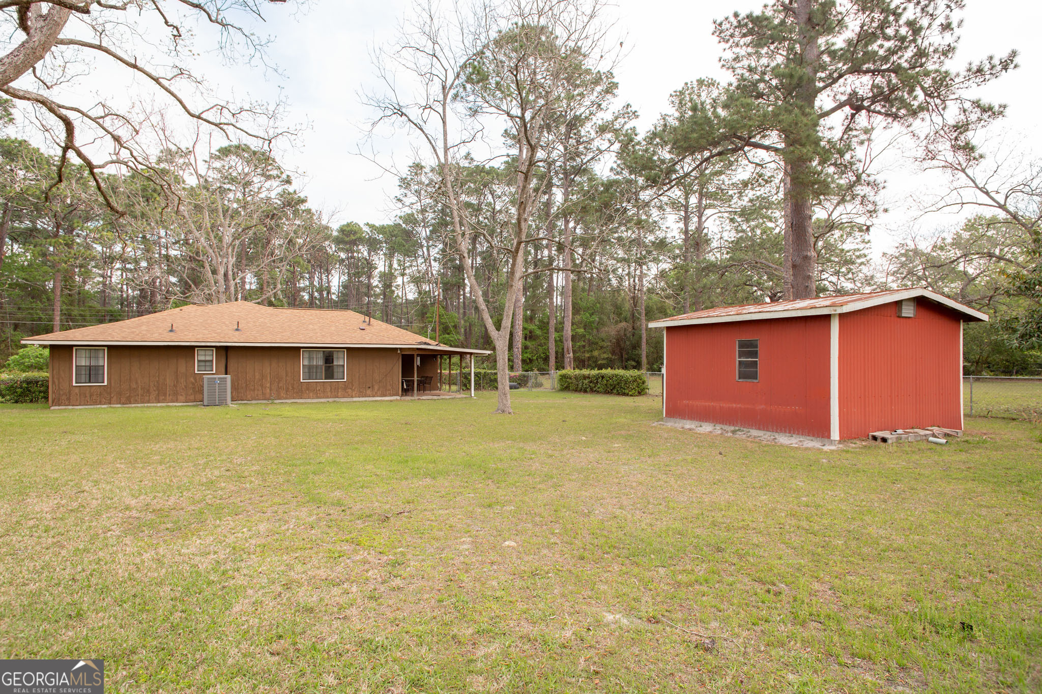 1917 Gilchrist Avenue Waycross, GA 31503 - Photo 38 of 42 a view of a yard with a trampoline