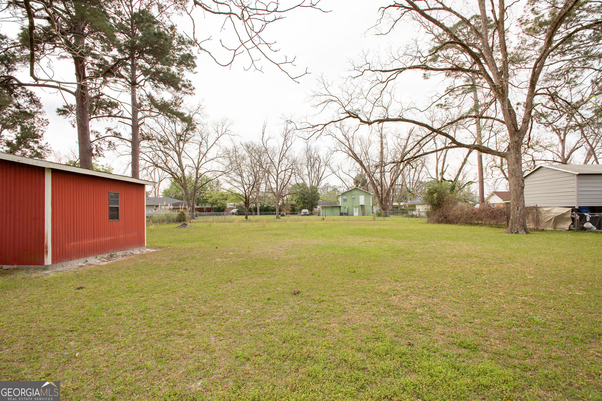 1917 Gilchrist Avenue Waycross, GA 31503 - Photo 40 of 42 a view of yard with tree in front of it
