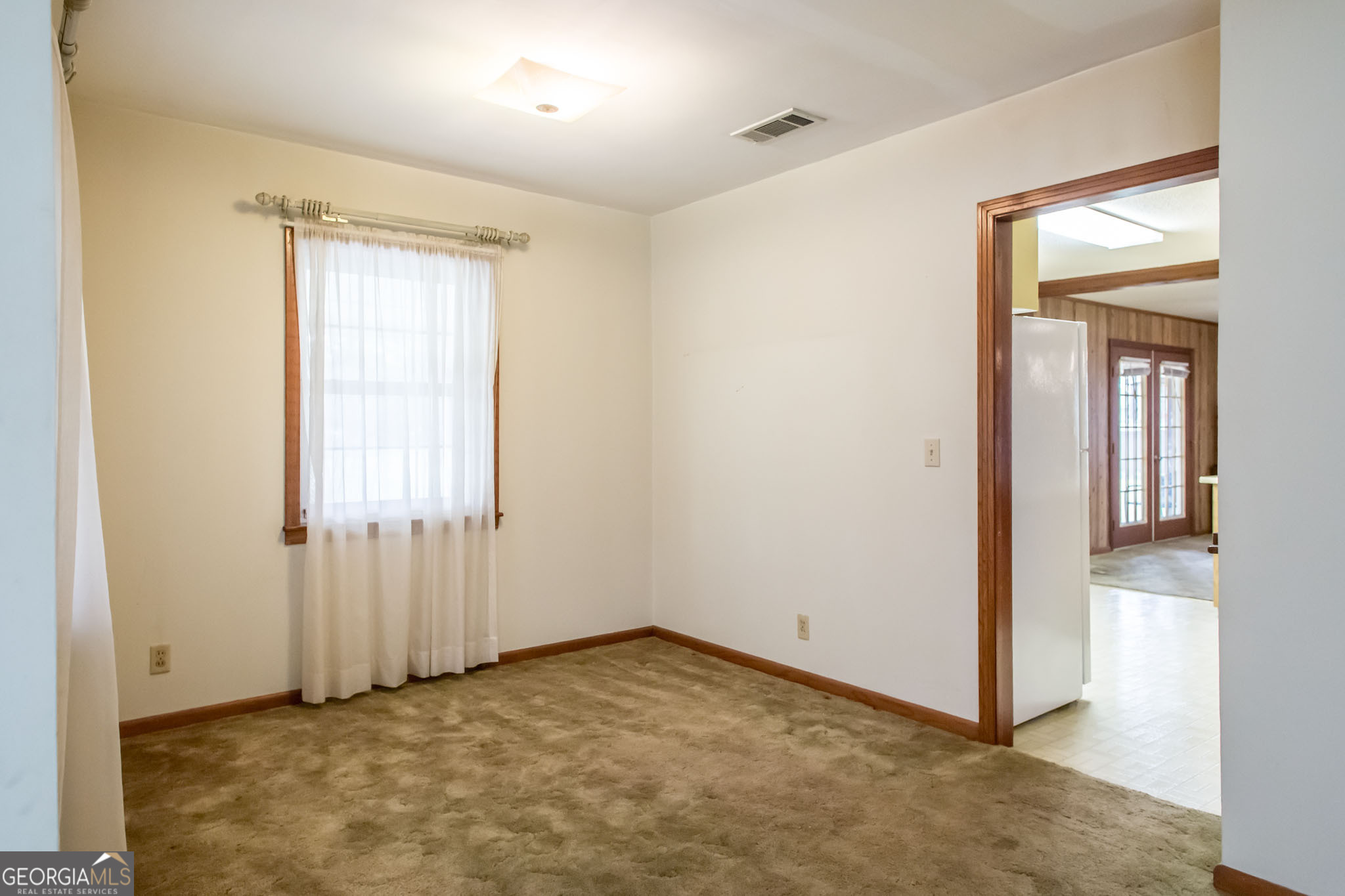 1917 Gilchrist Avenue Waycross, GA 31503 - Photo 8 of 42 an empty room with windows and closet