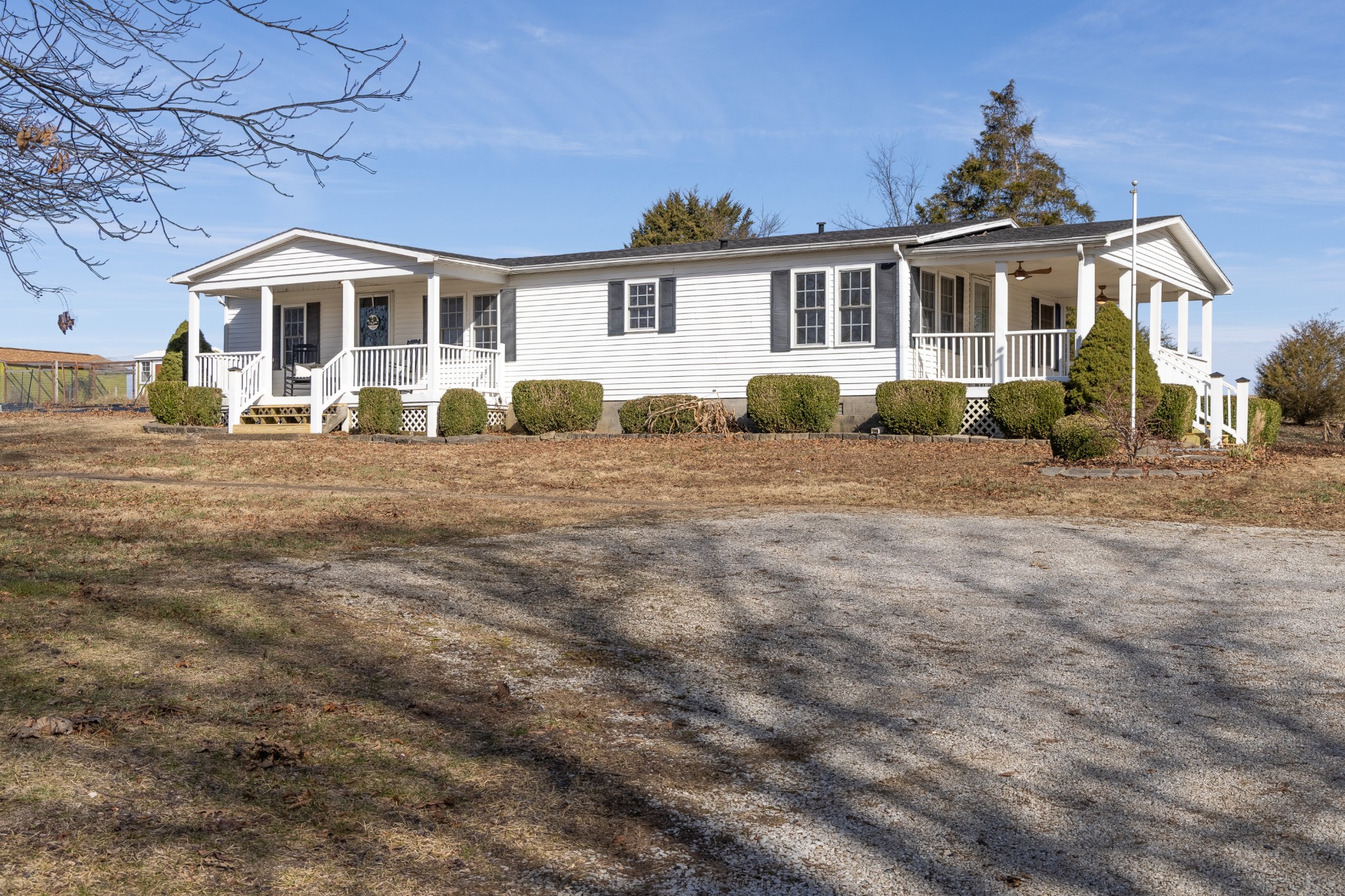 front view of a house with a patio