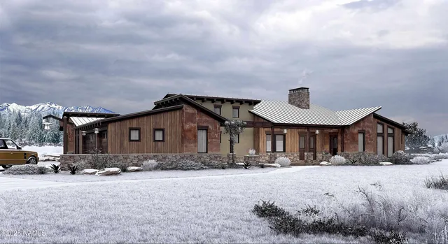 a front view of a house with a yard covered in snow