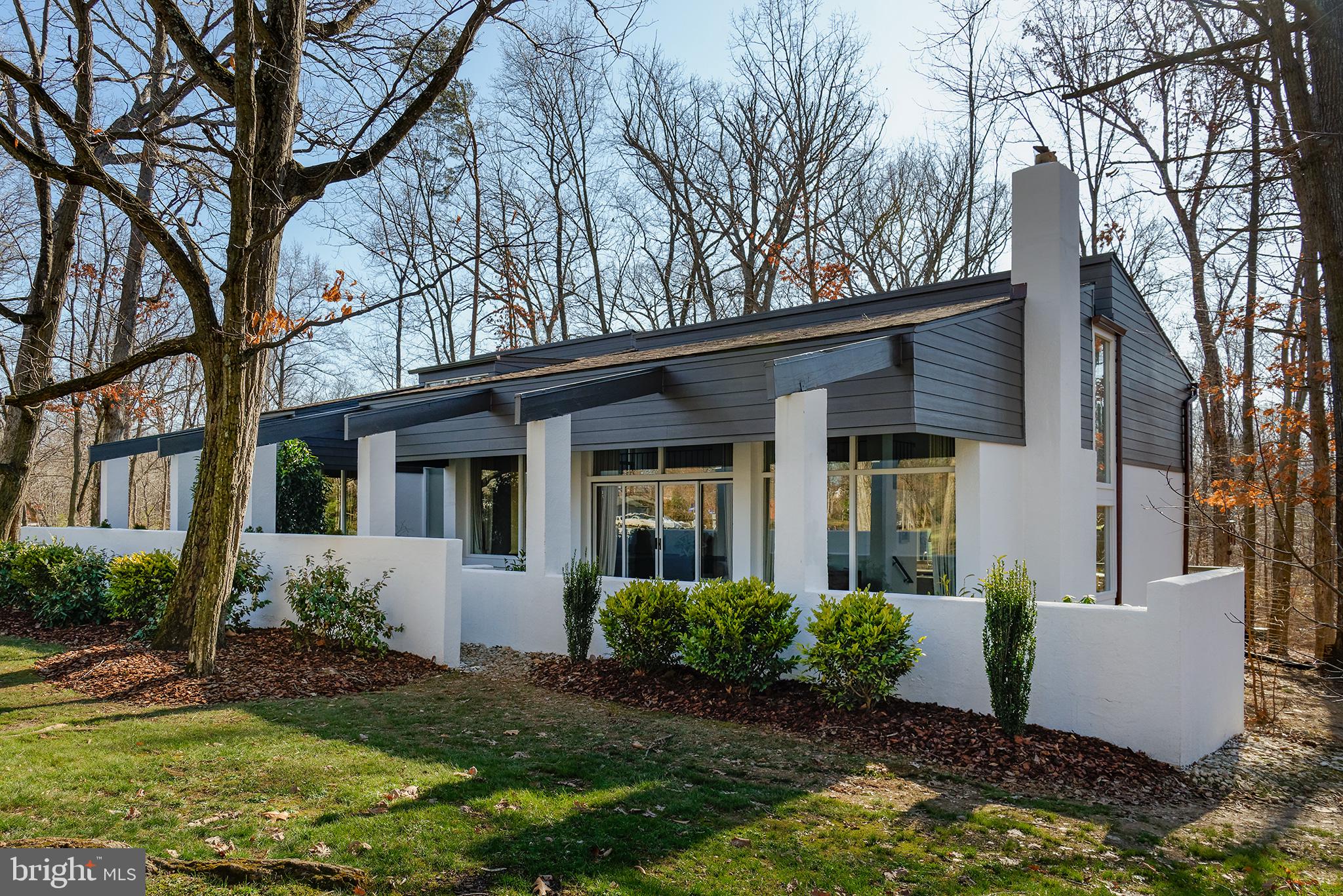11103 Wedge Drive Reston, VA 20190 - Photo 36 of 41 Front courtyard and wall of windows