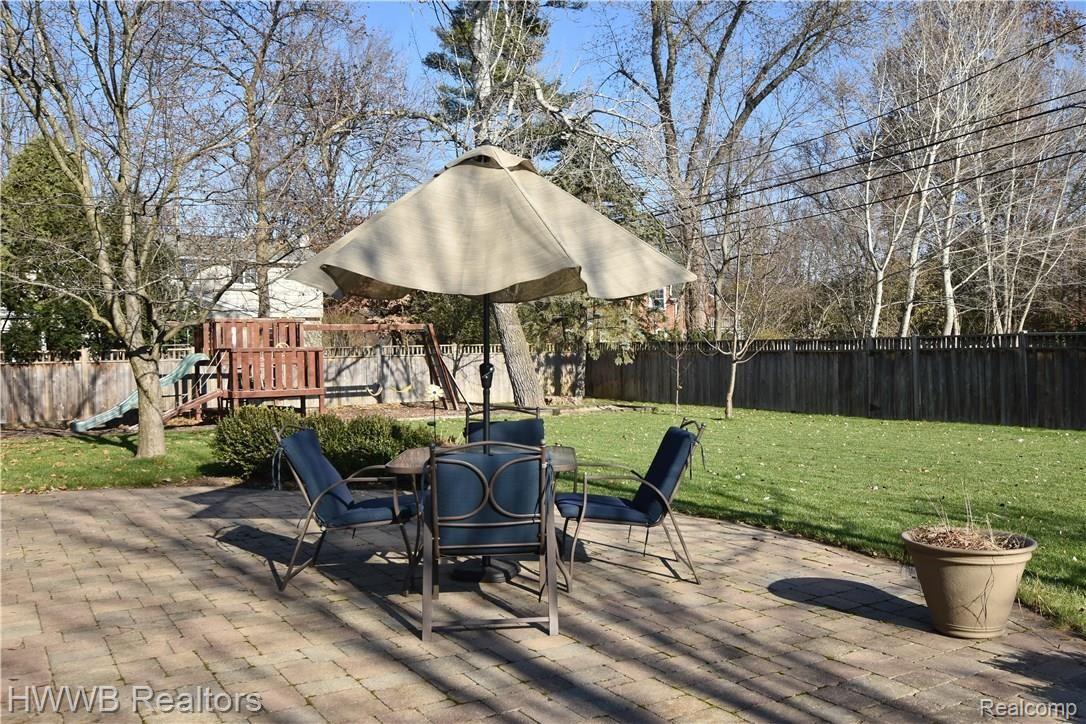 565 South Cranbrook Road Birmingham, MI 48009 - Photo 30 of 31 Paver patio can be accessed from the family room